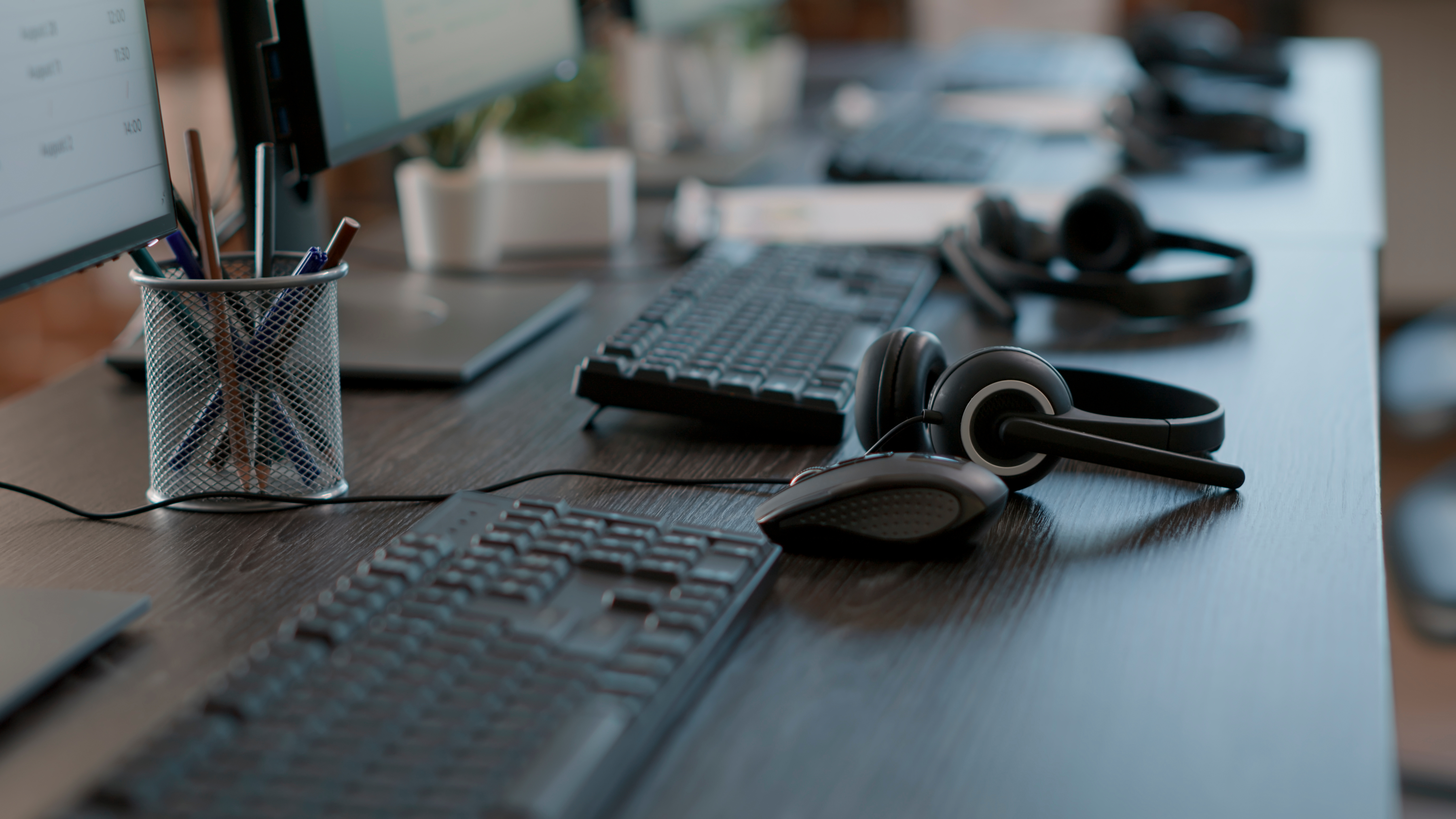 SAGLEV customer support team in modern office — desks, headphones, and collaboration spaces ready to answer your electric vehicle enquiries